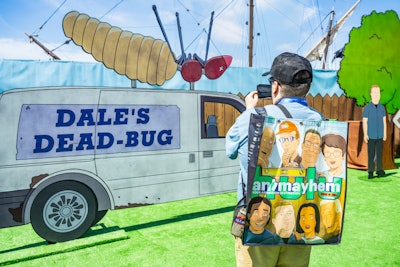 The backyard cookout area invited guests to unwind under umbrellas and picnic tables while watching clips from past and upcoming seasons on a giant grill screen. Branded food, lawn games, and appearances by Dale’s Dead Bug van rounded out the full Arlen experience.