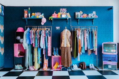Creative Riff collaborated with online thrift retailer ThredUp, who supplied and styled hundreds of items for the experience. QR codes linked to a shoppable landing page curated with styles inspired by characters from the shows and movies.