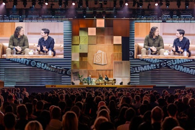'Guided by Shopify’s clear vision of making commerce better for everyone, the summit celebrated the merchant’s journey while staying true to the brand’s builder mentality,' said Sara Vinten, creative director at agency Mint. To drive that idea home, the main stage featured a design inspired by commerce elements, including hidden crate entrances and working garage doors.