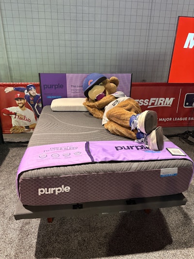 There were also massage chairs and popular mattresses and adjustable bases on site for fans to test out and potentially purchase, as well as a phone-charging station where fans could sit on massage chairs to “recharge” themselves and their phones. Fans could also snag custom pillowcases with the All-Star logo and Mattress Firm branding.