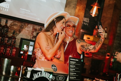The event included a Levi’s Heat Press Station, where guests could get custom shirts with branded patches; a Jack Daniel’s Hat Customization Bar with trucker hats and pins; and a Jack Daniel’s Slushy Truck that served Jack and Coke and Jack Blackberry Lemonade slushies. Attendees could also dine on fried chicken sliders from Bonafried and fries and popcorn from Pigeon Catering.
