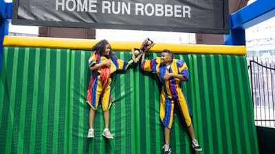 Fans could also don a Velcro suit and simulate catching a ball right before it flies into the stands for a unique photo opp.