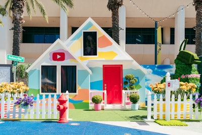 This space included a life-size topiary garden featuring characters from iconic games often highlighted on YouTube, plus a house for surprise creator meet-and-greets, food trucks with YouTube trend-worthy treats, and storefronts that housed photo activations for fans to create their own memories. There were other surprise-and-delight elements scattered throughout each activation day.